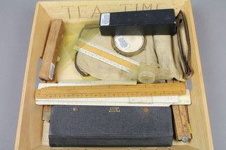 A geometry set, various drawing instruments etc