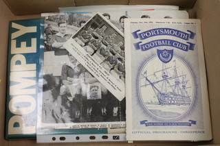 A collection of 1950's Portsmouth and other football programmes, signed photographs etc