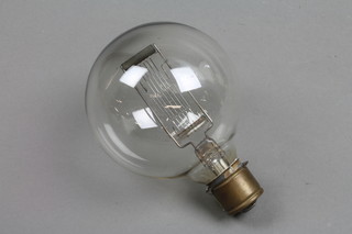 A large vintage light bulb 4"