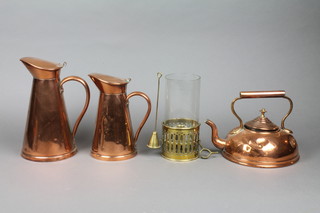 2 copper jugs 10" and 8", a circular copper kettle and a glass and brass chamber stick 