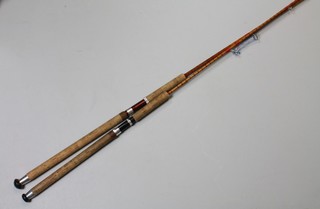 2 cane 2 section fishing rods, both marked J B Long, 8'3" medium and 9'10"