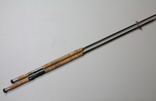 A Fibatube twin section carbon fibre fishing rod with replacement top 12' together with a Fibatube 3 section salmon rod no.8 12'6" 