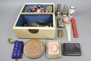 A Chinese painted box containing a quantity of mainly early 20th Century curios including a bronze ink block, money etc