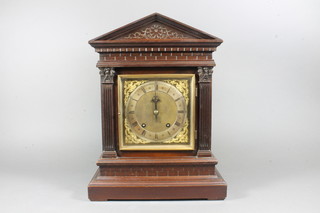 A late Victorian walnut bracket clock of architectural form set Roman and Arabic dial, flanked by fluted composite pilasters,  having 8 day movement, signed S & H, SOH, chiming gongs,  16.5"h x 12.5"w x 8"d