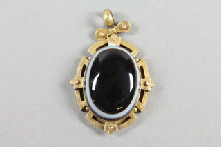 A Victorian gold plated banded agate pendant