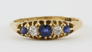 A Victorian 18ct 5 stone diamond and sapphire ring