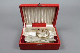 An Indian white metal cased brush, comb and box set