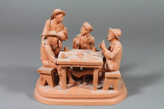A terracotta group of card players, unglazed 5"