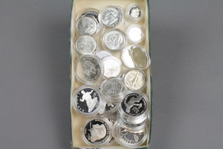 A quantity of silver proof and un-circulated coins and crowns
