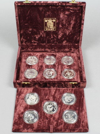 A boxed set of 11 silver commemorative crowns
