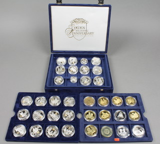 A boxed set of 36 silver proof coins