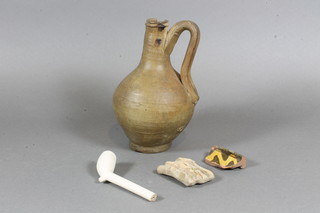 A stoneware jug 6.5", chip to mouth, 2 sections of pottery and a  clay pipe - f,