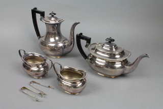 A silver plated 4 piece tea and coffee set with gadrooned rims, 2 pairs of nips