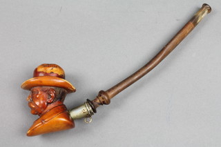 A 19th Century carved Meerschaum cheroot holder in the form of a gentleman with homburg hat