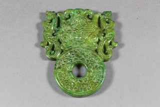 A carved green hardstone pendant 3"