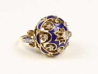 A 9ct gold blue enamel and 9 stone diamond dress ring