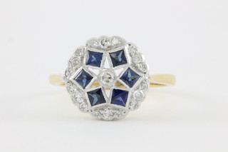 An 18ct yellow gold sapphire and diamond cluster ring