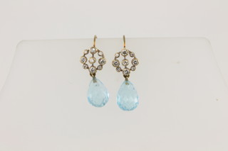 A pair of yellow gold 9 stone diamond and faceted pear cut blue topaz earrings, approx. 0.50ct diamonds