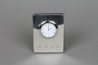 A silver framed quartz desk timepiece 4"