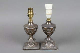A pair of Victorian Adam style silver baluster table lamps decorated with swags and festoons, Sheffield 1895, 6" 