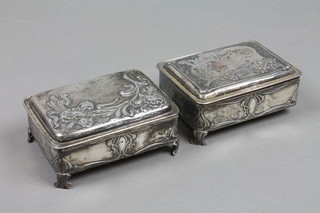 A pair of repousse silver trinket boxes with stylised floral motifs, scroll feet, Birmingham 1905, 5" 