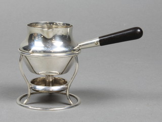 A miniature silver brandy warmer and stand