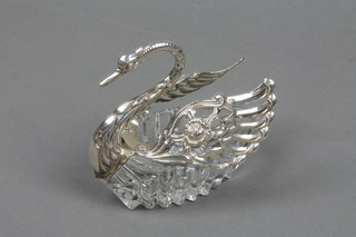 A Continental silver mounted swan bowl with cut glass base