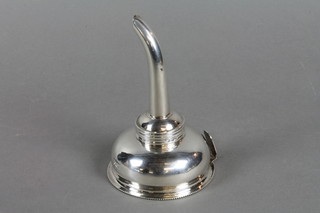 A George III silver wine funnel with beaded rim and plain body having armorial crest 6"