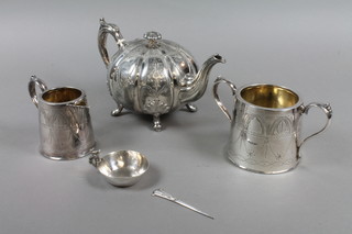 A silver plated melon shaped teapot, sugar basin, cream jug, tastevin and skewer  