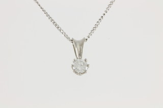 A 9ct gold diamond pendant, approx. 0.3ct, hung on a ditto chain