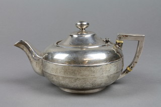 A silver squat baluster batchelor's teapot with ivory reisistors