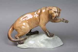 A Beswick figure of a Cougar on a rocky base 1702 13" 