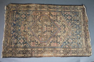 A "Caucasian" rug with diamond to the centre within multi-row borders 67" x 44"