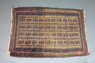 An Afghan rug with all-over geometric design 52" x 35" 