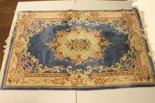A blue ground and floral patterned Chinese rug 92" x 39"
