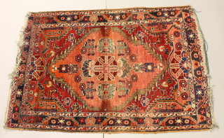An Afghan rug with multi-row borders 60" x 41"