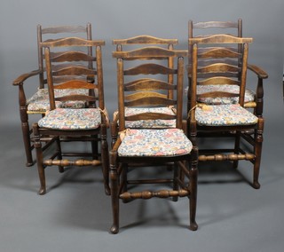 A set of 6 oak ladder back chair, 2 with arms, with solid seats, raised on pad feet