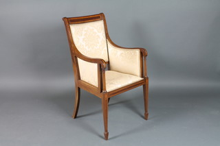 An Edwardian inlaid mahogany show frame armchair, raised on square tapering supports, spade feet