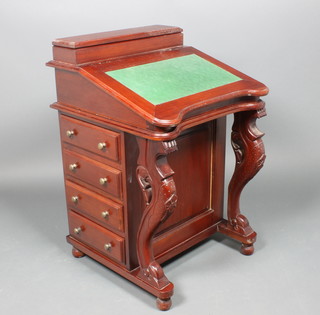 A Victorian style mahogany Davenport desk of serpentine outline, the fall set a green skiver, the pedestal fitted 8 long drawers raised on cabriole supports 33"h x 21 1/2"w x 22"d 