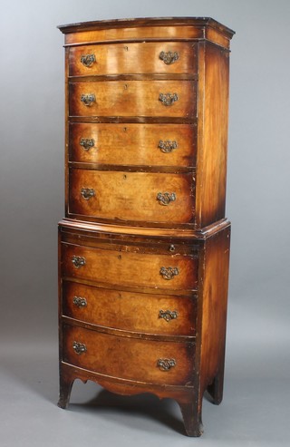 A Queen Anne style bow front chest on chest, the upper section with moulded cornice fitted 4 long drawers, the base with brushing slide above 3 drawers, raised on bracket feet 65 1/2"h x 26"w x 18"d
