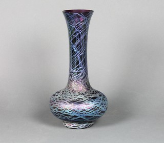 A Loetz style purple ground baluster vase with elongated waisted neck and flared rim 14"