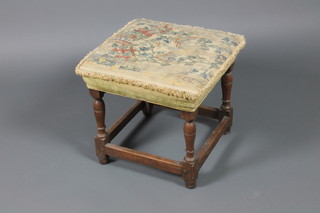 A square oak stool with tapestry seat, raised on turned and block supports, (some worm, treated and old) 16" x 17 1/2" x 16" 