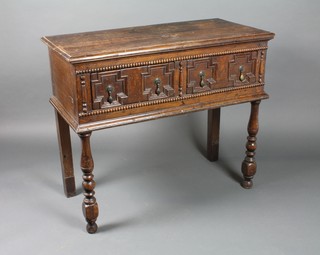 A Georgian oak serving table with 2 moulded drawers on baluster legs 32"h x 38" x 18"
