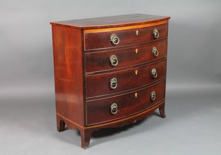 A William IV mahogany bow front chest of 4 long drawers with satinwood cross banding, brass drop handles and ivory escutcheons, raised on bracket feet 39"h x 39 1/2"w x 21"d