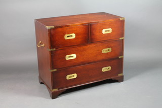 A mahogany military style chest of 2 short and 2 long drawers, with brass banding and brass carrying handles to the sides, raised on bracket feet 30"h x 34"w x 18"d