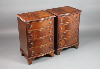 A pair of Georgian style serpentine fronted chests of 4 long drawers, raised on bracket feet 27 1/2"h x 19"w x 15"d