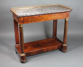 An Empire style mahogany serving table with pierced brass three-quarter gallery and black veined marble top, the base fitted a drawer, raised on a turned column with undertier 35 1/2"h x 40"w x 20"d