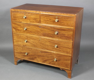 A Georgian inlaid mahogany chest of 2 short and 3 long drawers with brass escutcheons and circular brass handles, raised on bracket feet 40 1/2"h x 42"w x 20 1/2"d