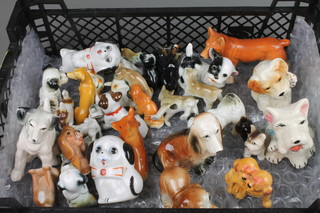 A quantity of china and porcelain figures of animals
