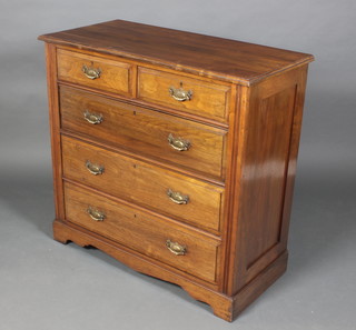 An Edwardian Art Nouveau walnut chest of 2 short and 3 long drawers with brass plate handles and escutcheons, raised on bracket feet 39"h x 40"w x 19 1/2"d